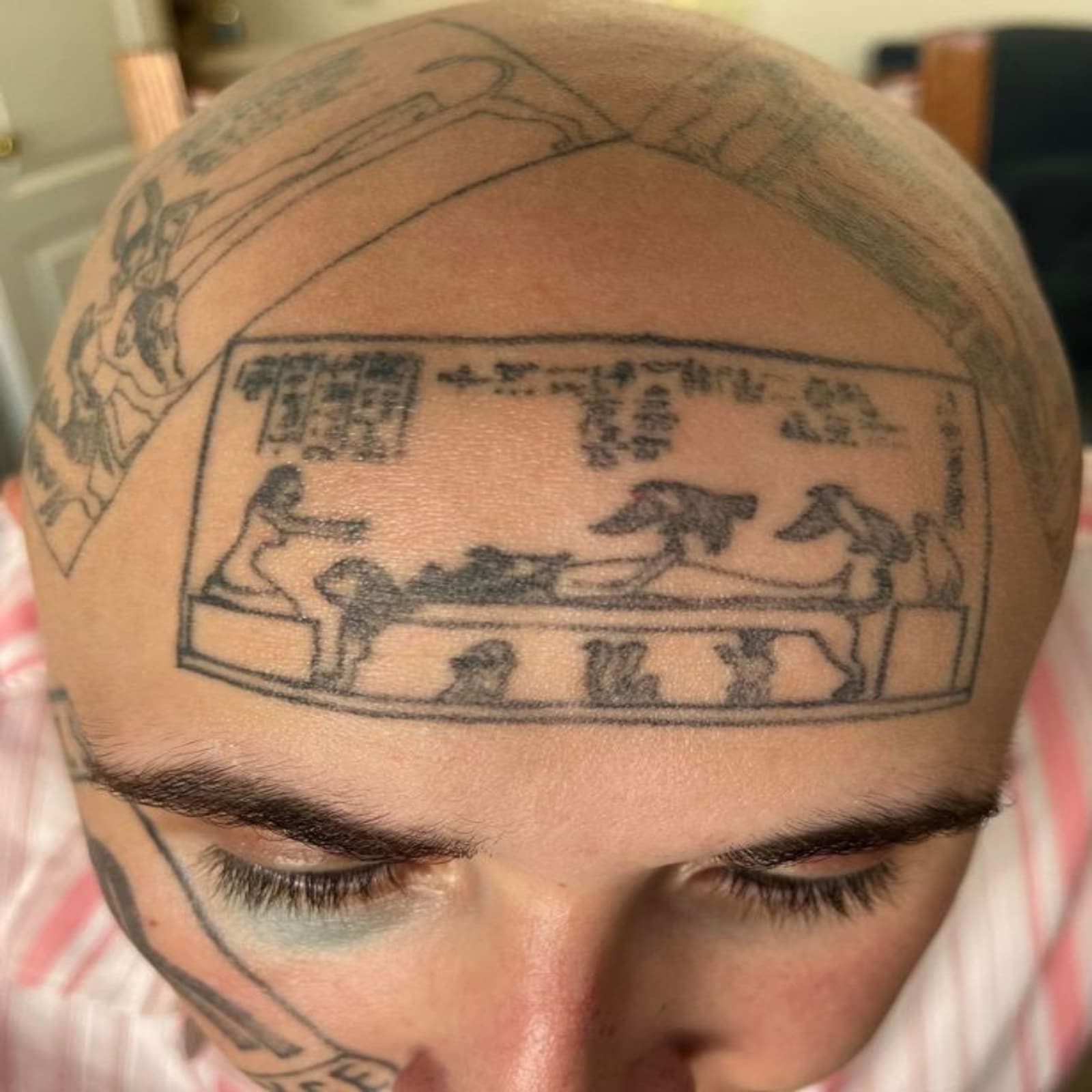 man with rolls royce tattoo 1